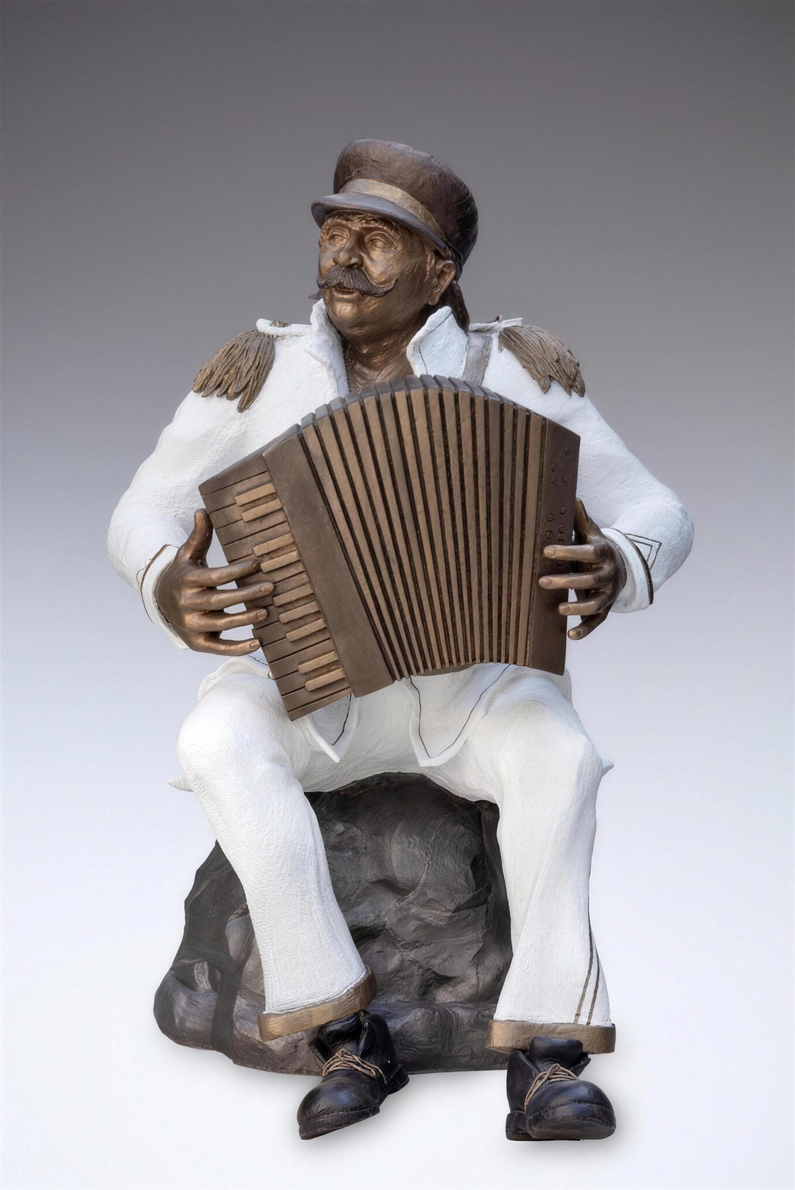 Krishen Khanna, Retired Captain Ramesh Kumar Accordion Wale: seated bandwalla in a white uniform and cap playing an accordion, resinated fibreglass with automotive paint